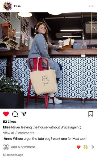 Elise enjoys a coffee break, her Maison Memoire tote by her side, a testament to never forgetting her beloved French Bulldog Bruce.